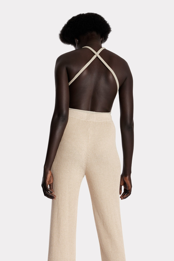 All natural zero waste knitted cotton pants in sand with eco rib knit bodysuit in sand colour back side closeup view.