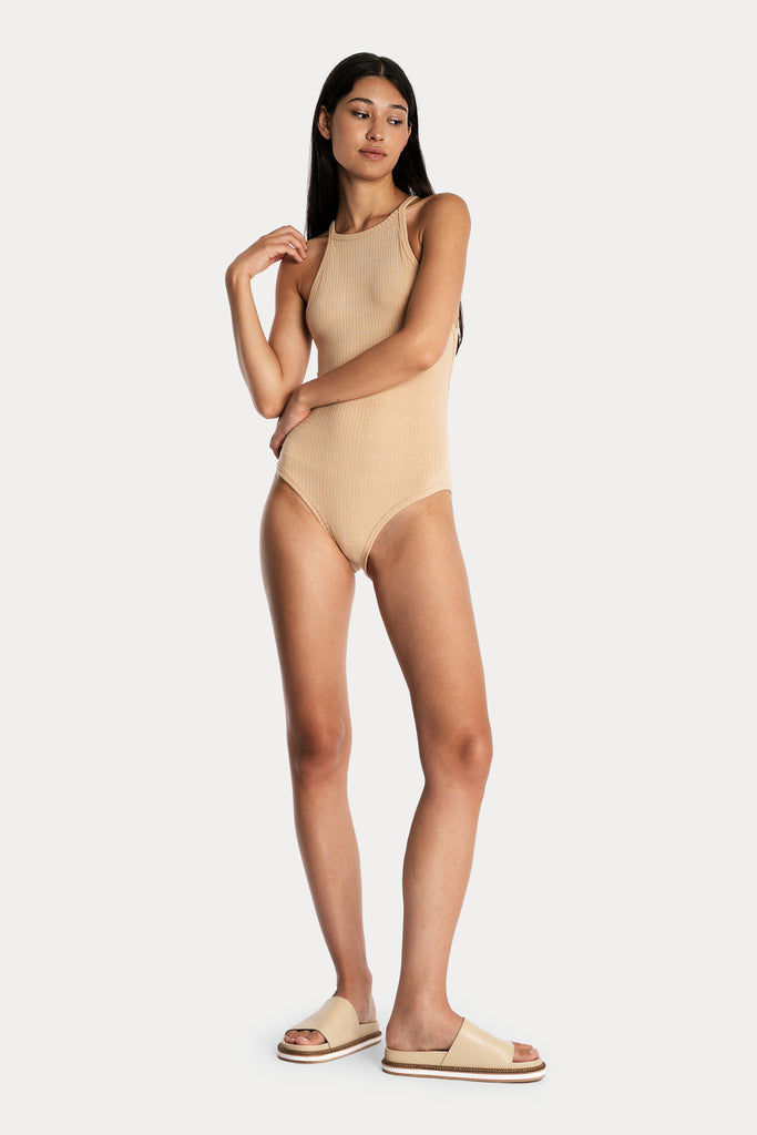 ECO RIB BODYSUIT | TAN; front side full body view.