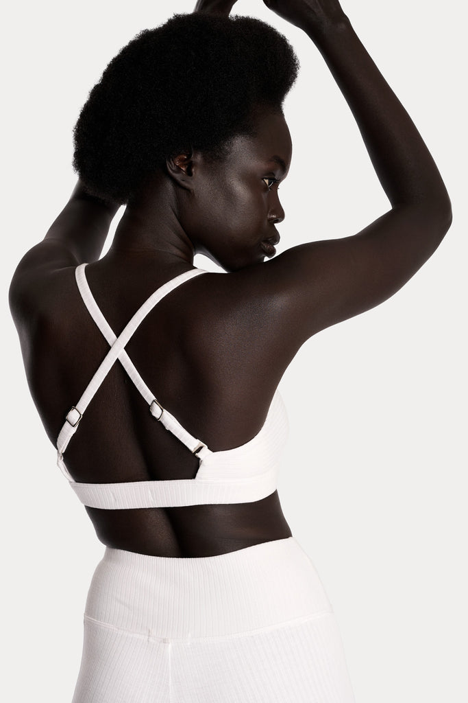 ECO RIB BRALETTE | WHITE with ECO RIB STIRRUP LEGGINGS | WHITE; back side close up view.