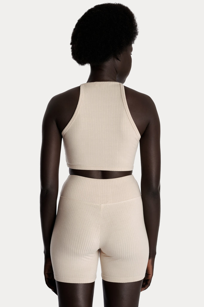 ECO RIB CROP TOP | SAND with ECO RIB BIKER SHORTS | SAND; back side closeup view.