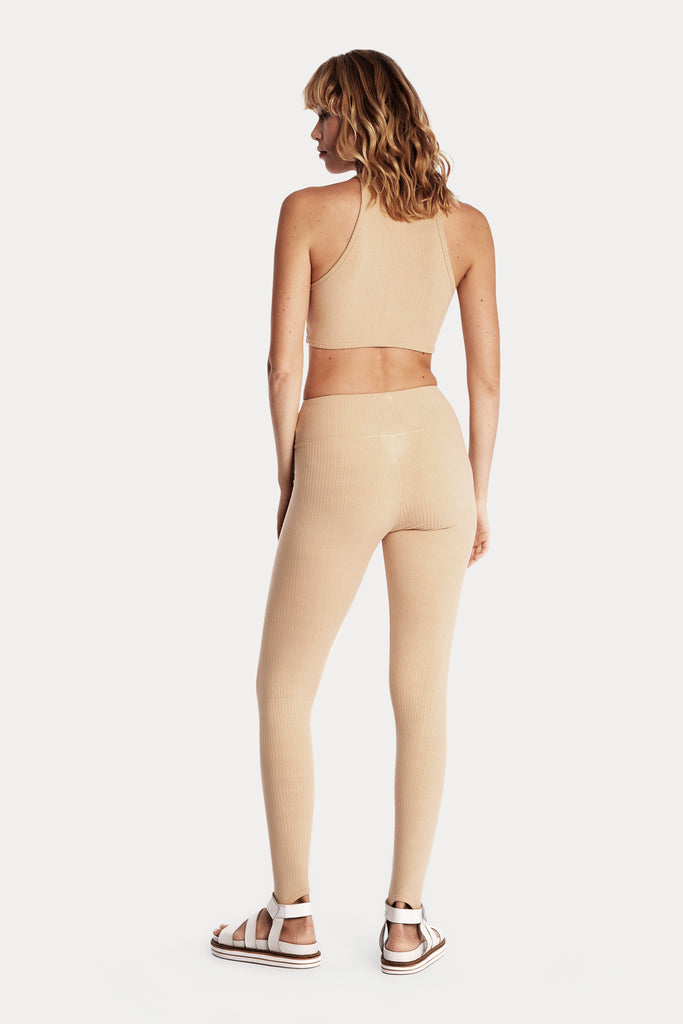 ECO RIB CROP TOP | TAN with ECO RIB STIRRUP LEGGINGS | TAN; back side full body view.