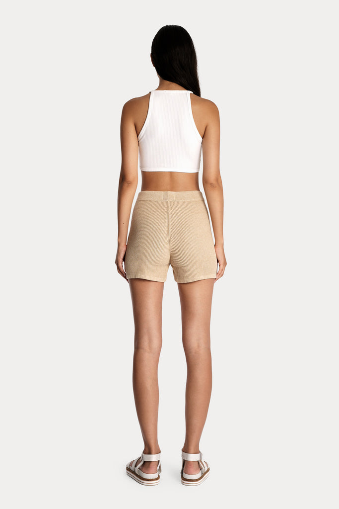 ECO RIB CROP TOP | WHITE with KNITTED COTTON RIB SHORTS | SAND; back side full body view.