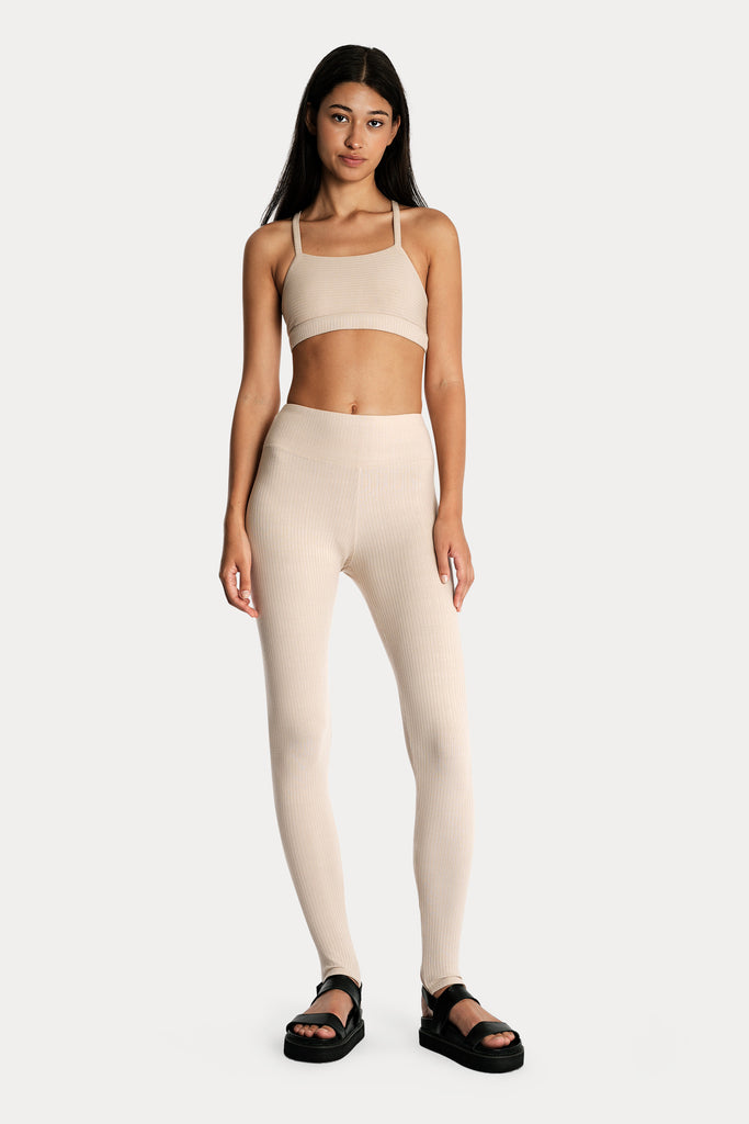 Lenzing ecovero eco rib jersey knit bralette in sand with stir up leggings in sand front side full body view.