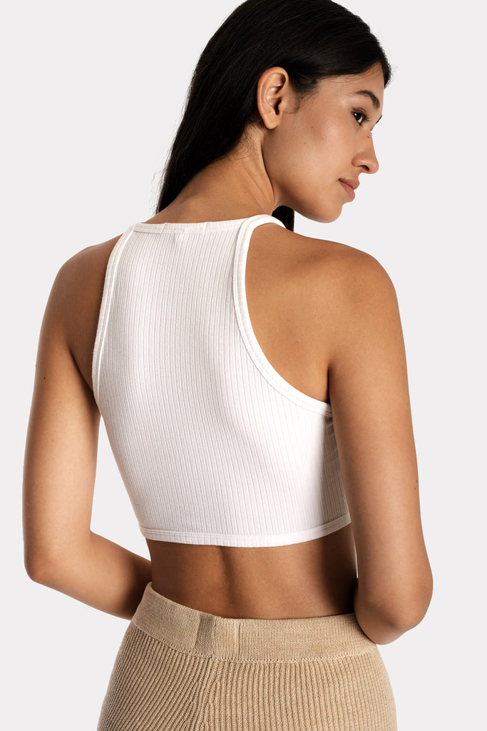Lenzing ecovero eco rib jersey knit crop top in white with knit biker shorts in tan colour back side closeup view.