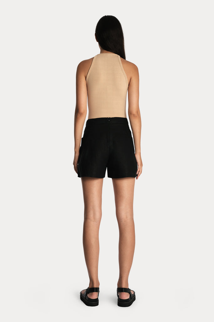 Lenzing ecovero eco rib jersey knit tanktop in tan with knit cotton shorts in black back side full body view.
