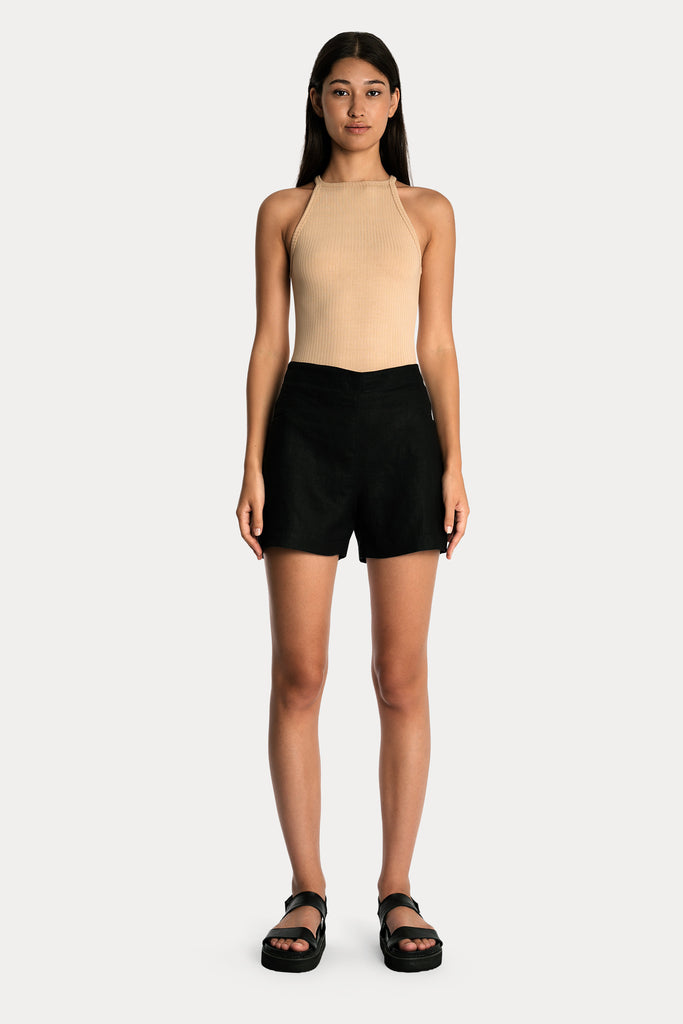 Lenzing ecovero eco rib jersey knit tanktop in tan with knit cotton shorts in black front side full body view.