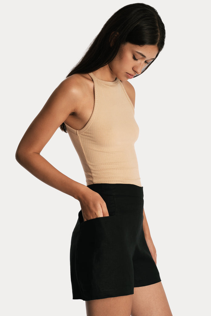 Lenzing ecovero eco rib jersey knit tanktop in tan with knit cotton shorts in black right side closeup view.