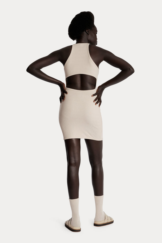 ECO RIB MINI DRESS | SAND; back side full body view.