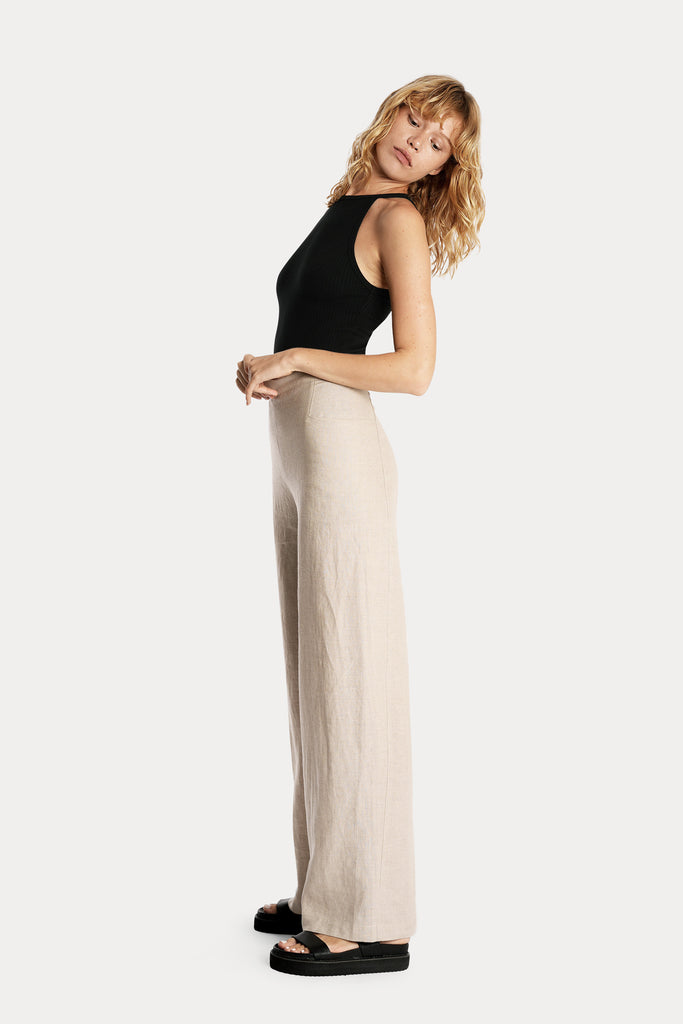 ECO RIB TANK TOP | BLACK with LINEN WIDE LEG TROUSERS | SAND; left side full body view.